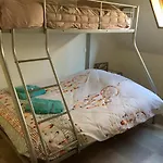 Au Nid De